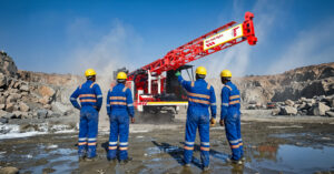 Exploration drill rig conducting core sampling